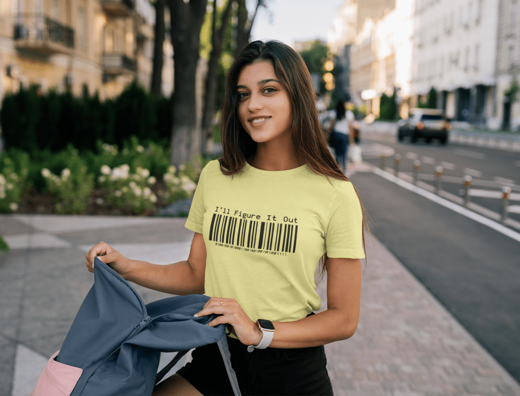 young girl looking in her backpack wearing a yellow barcode I'll Figure It Out Binary code IFIO t shirt.